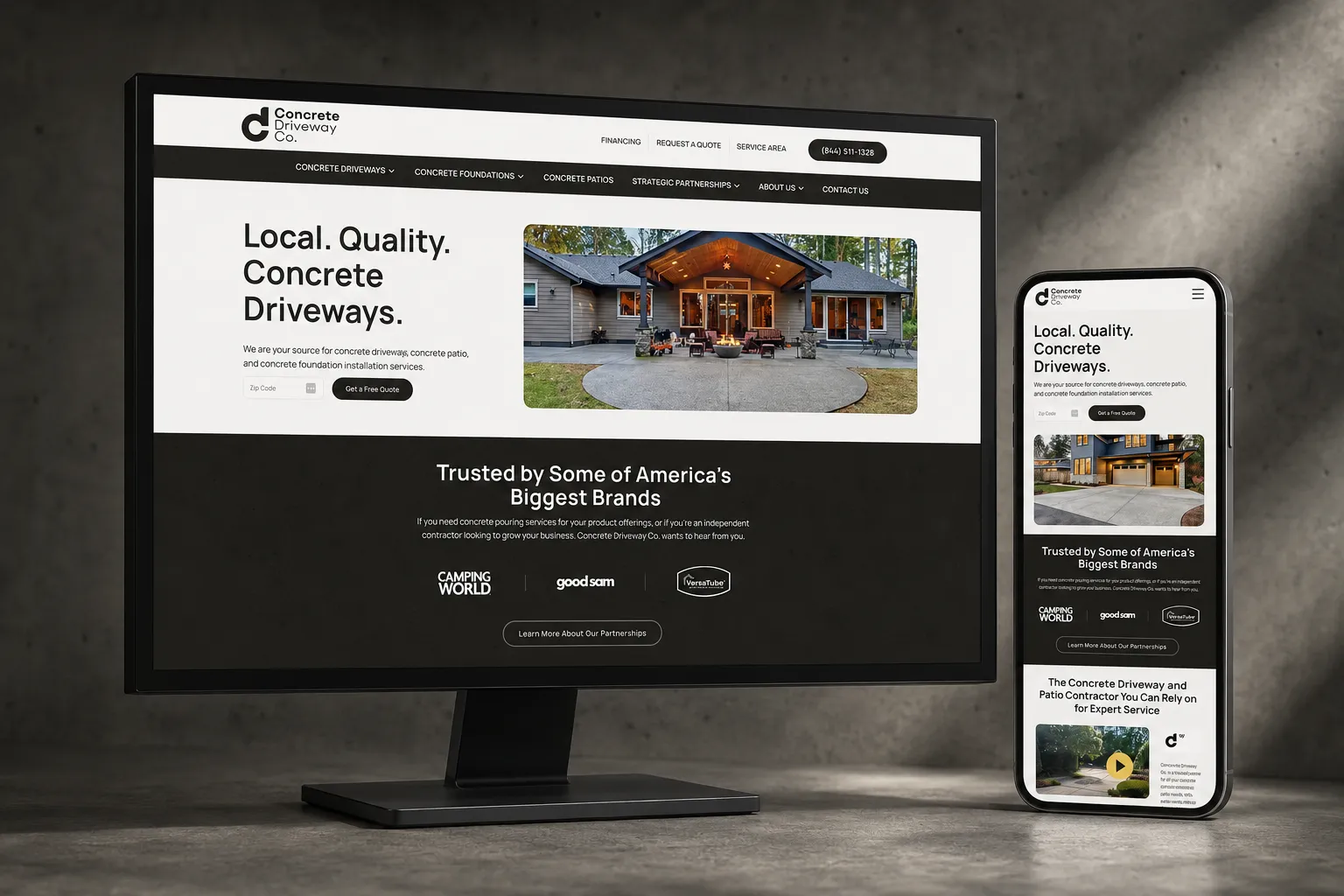 mock-up of concrete driveway company marketing website in monitor and phone